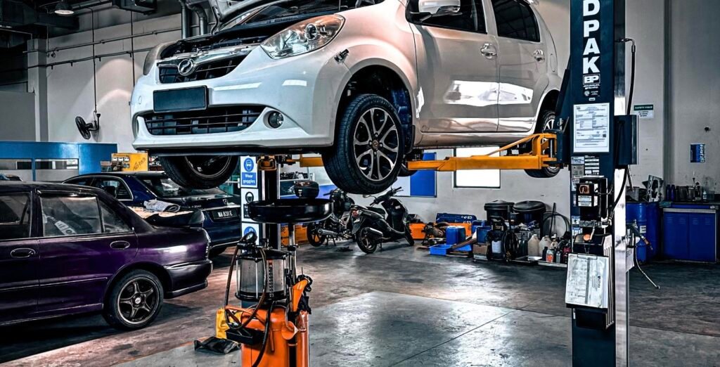 Mechanic servicing a car on a lift for tire installation and wheel alignment at Smart City Tires auto repair shop in Miami, FL